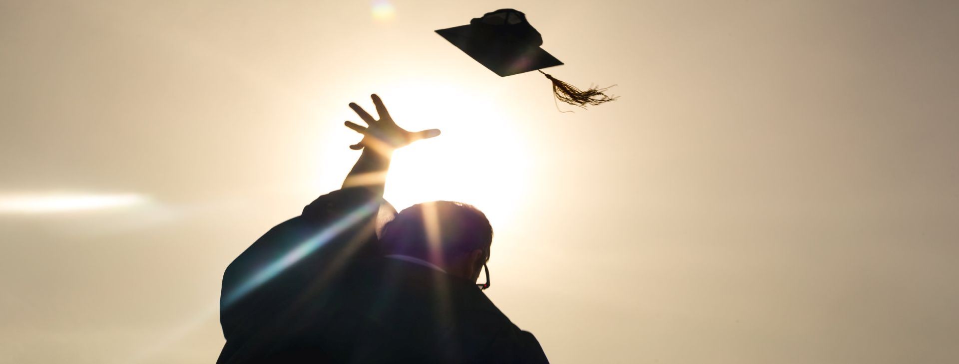 grad-student-throwing-up-cap